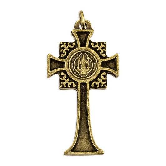 An antique bronze cross pendant featuring a central circular medallion of the Virgin Mary and ornate scrollwork on the cross arms, shown against a plain white background.