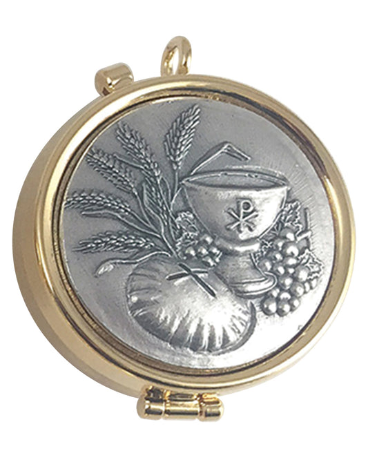 Round decorative item with gold frame and silver emblem on a white background