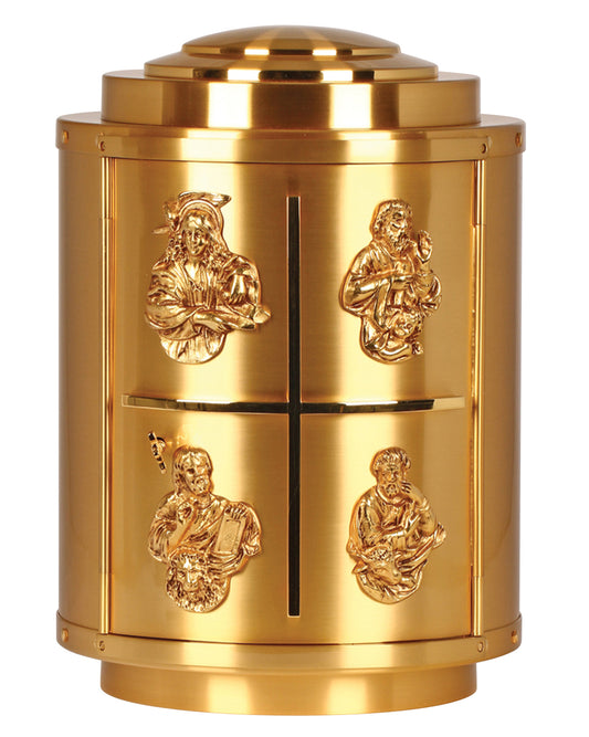A shiny gold cylindrical metal container with four raised decorative figures arranged in a two-by-two grid, photographed on a plain white background.