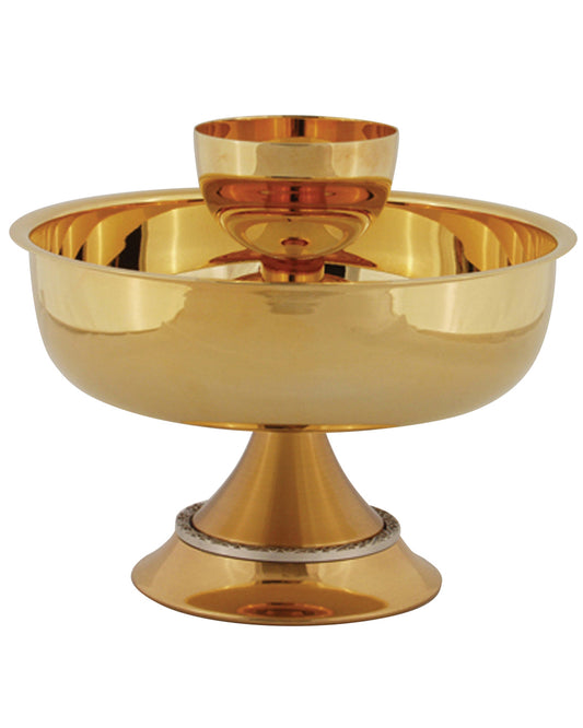 Gold bowl with a central spout on a white background