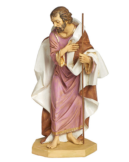 Statue of a religious figure in a robe holding a staff on a white background