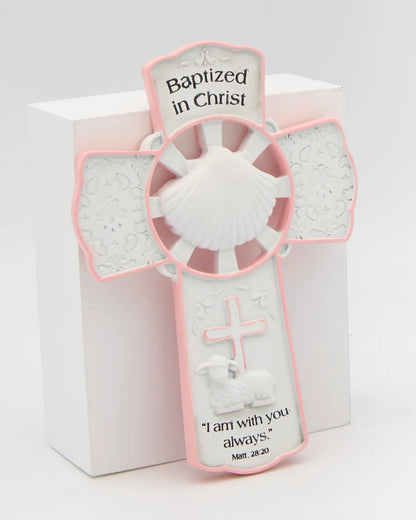 Decorative cross with pink accents and inscriptions on a white background