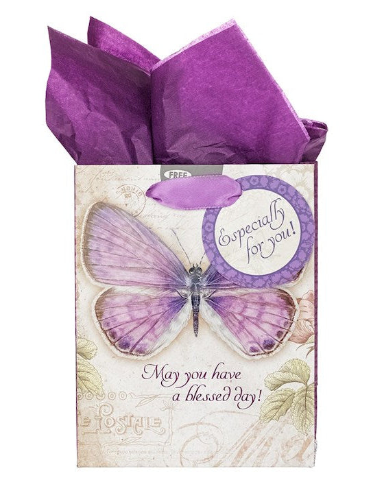 A purple butterfly gift bag in a decorative envelope with purple tissue paper, featuring a large purple butterfly illustration and the text 'Especially for you!' and 'May you have a blessed day!'.