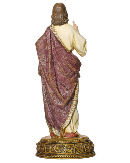 Statue of a religious figure with a purple robe and gold base on a white background