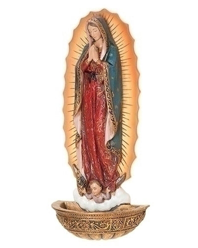 Statue of a religious figure in a decorative frame on a white background