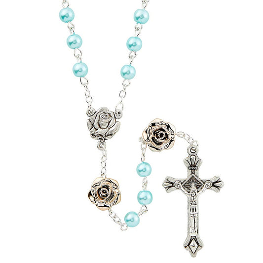 A silver-toned rosary with iron chain and imitation pearl beads, featuring a crucifix and a centerpiece.