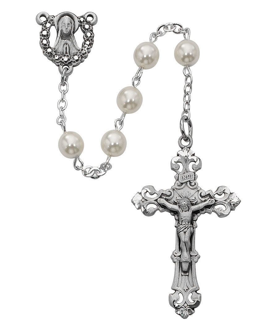 Silver rosary with pearls on a white background