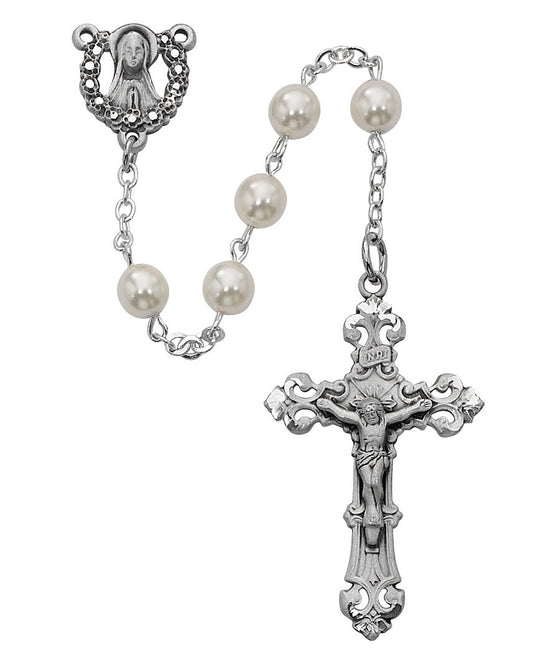 Silver rosary with pearls on a white background