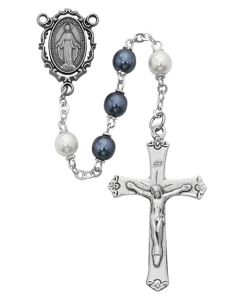 Rosary with blue and white beads and a silver cross on a white background