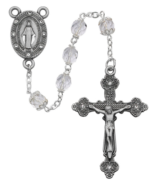 Silver rosary with clear beads on a white background