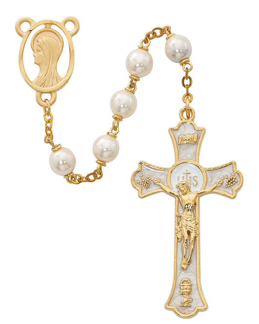 Gold and pearl rosary with a crucifix on a white background