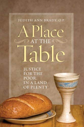 Book cover of 'A Place at the Table' with bread and chalice on a wooden table.