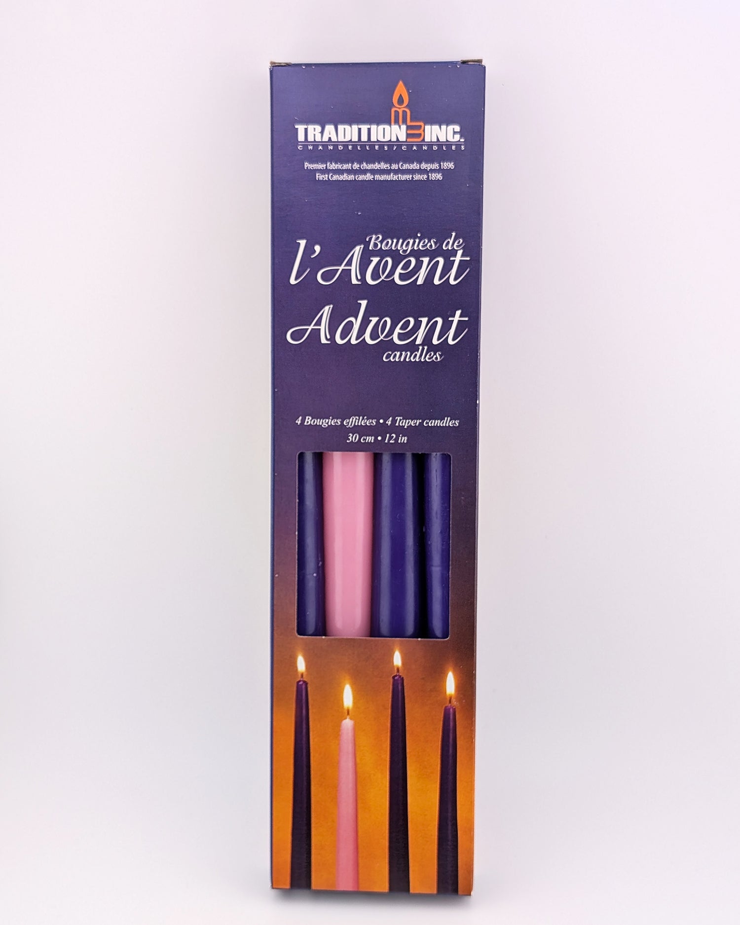 Packaging of Advent candles with purple, pink, and black candles on a white background.
