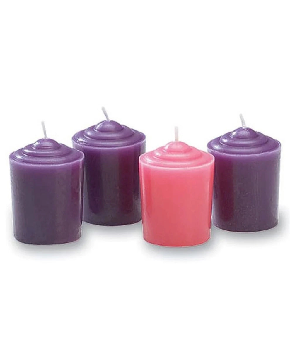 Set of four candles in purple and pink on a white background