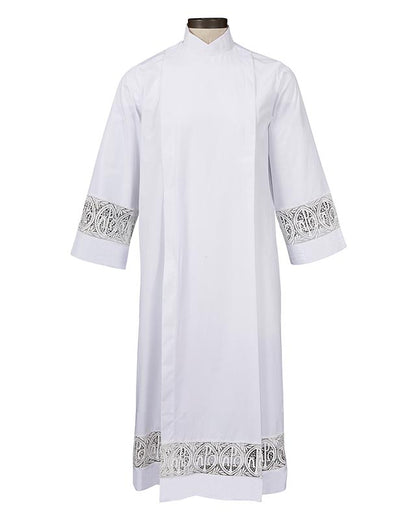 A white Alpha and Omega lace insert front wrap alb with designed collar, sleeves with lace detailing, and a Velcro closure at the shoulder.