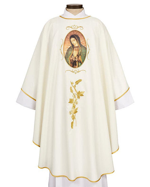 A white chasuble with a gold-embroidered image of Our Lady of Guadalupe and gold lace trim.