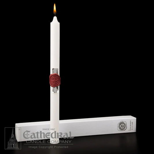 White candle with red wax seal and Cathedral Candle Company packaging on a black background