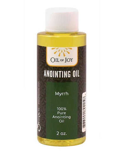 Bottle of Oil of Joy Myrrh anointing oil on a white background