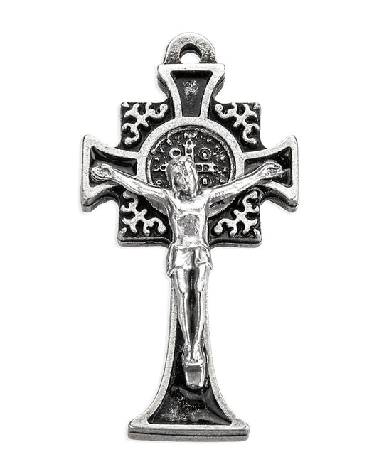Silver crucifix pendant on a white background