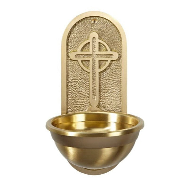 Brass wall-mounted bowl with decorative cross design on a white background