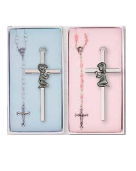 Two rosary sets in packaging, one blue and one pink, with angel and cross designs.