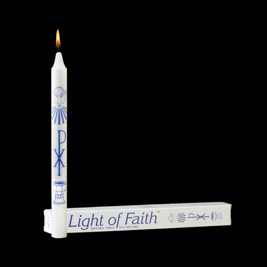 Light of Faith candle with packaging on a black background
