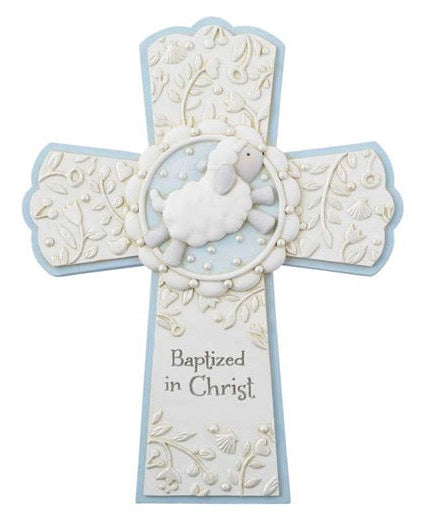 A resin baptism cross with soft blue and pearlized painted features, with the words 'Baptized in Christ' inscribed on it.