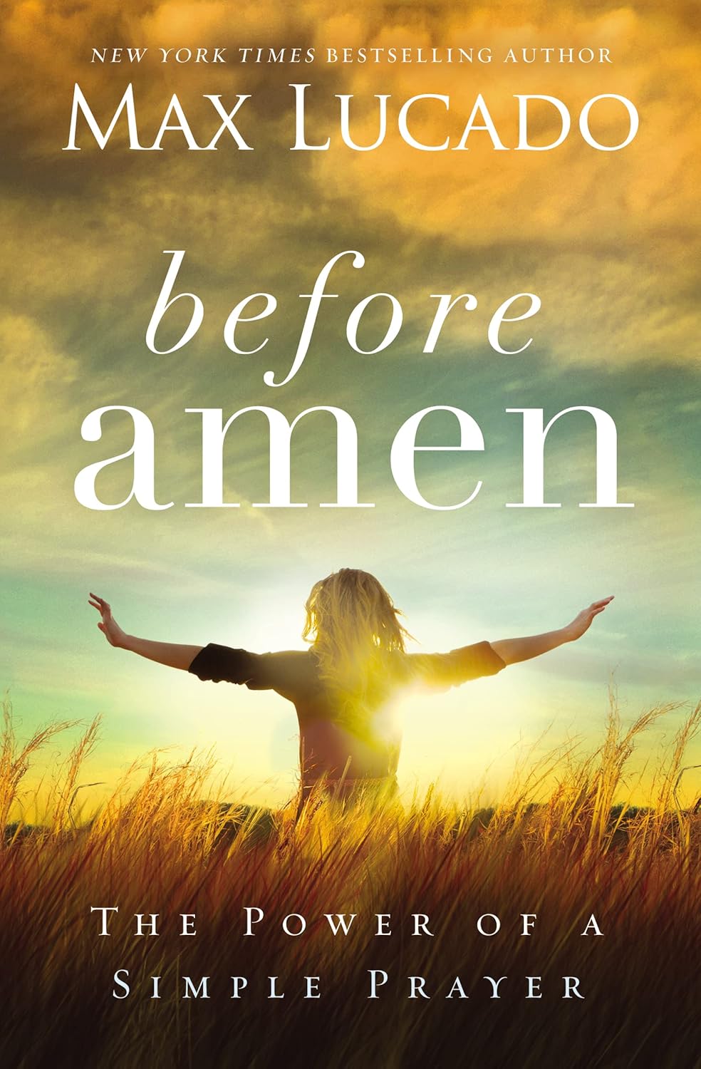 Book cover of 'Before Amen' by Max Lucado with a person in a field at sunset.