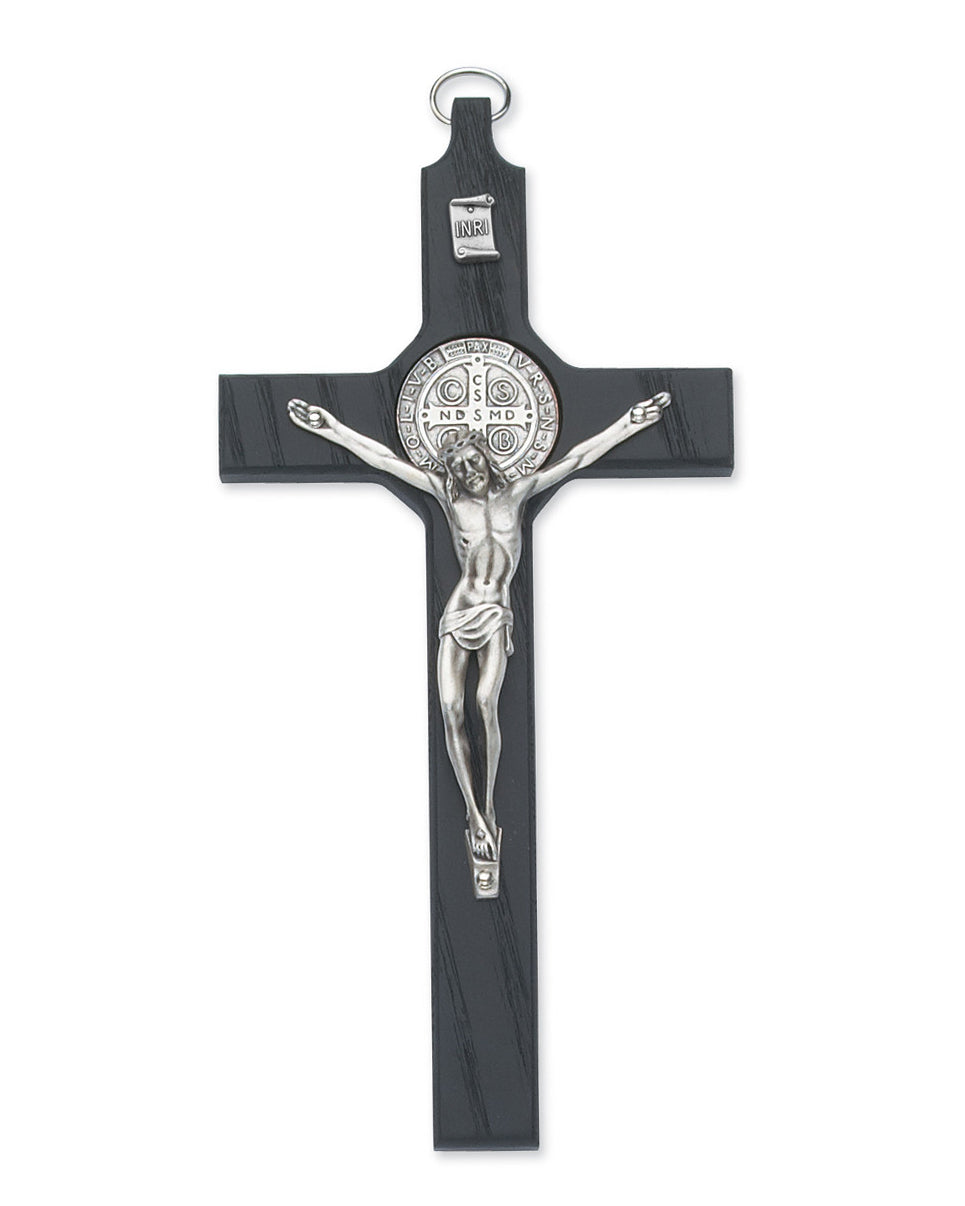 Black crucifix with silver Jesus figure on a white background