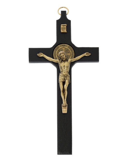Black crucifix with gold Jesus figure on a white background