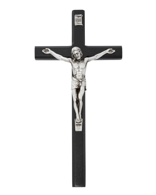 Black crucifix with silver Jesus figure on a white background