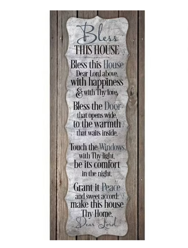 Decorative wooden sign with engraved text on a wooden background