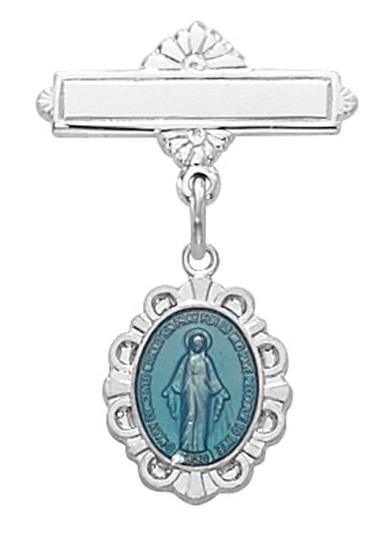 A blue enamel miraculous medal pin with a white ribbon, attached to a sterling silver lapel pin.