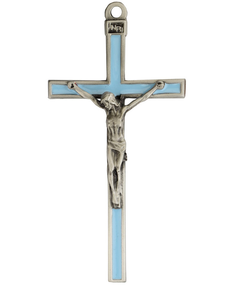 Cross with blue center and silver crucifix on a white background