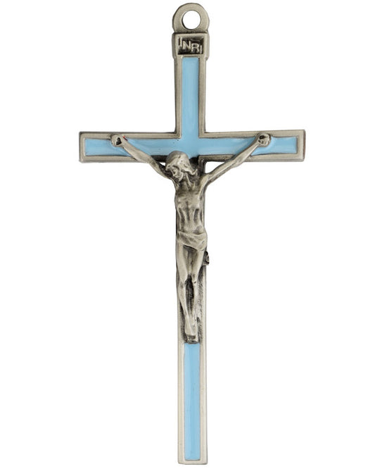 Cross with blue center and silver crucifix on a white background