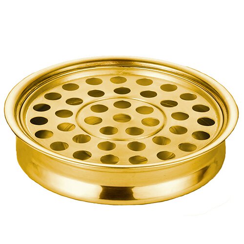 A gold-colored brass communion tray with a pattern of holes in the center.