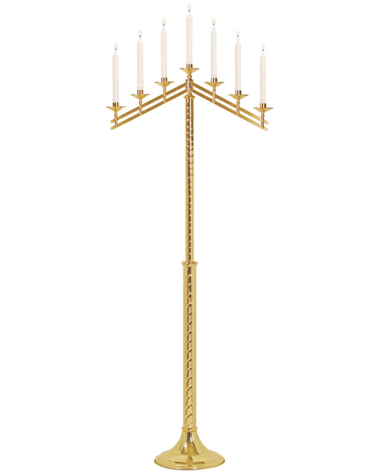 Gold candelabra with six candles on a white background
