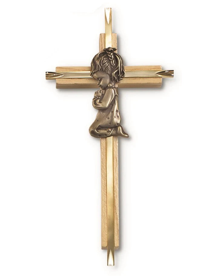 Gold cross pendant with a child figure on a white background