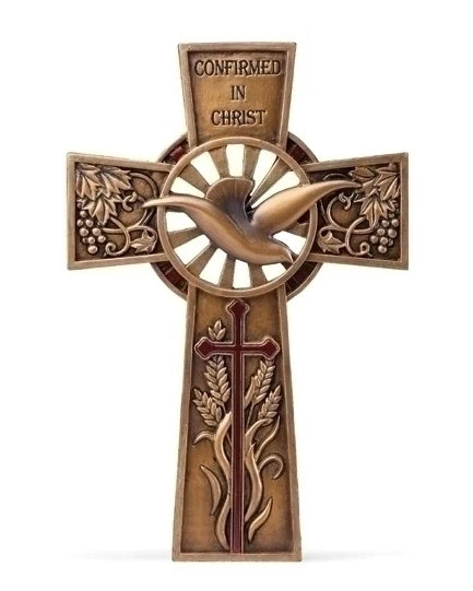 Bronze cross with dove and engraved text on a white background
