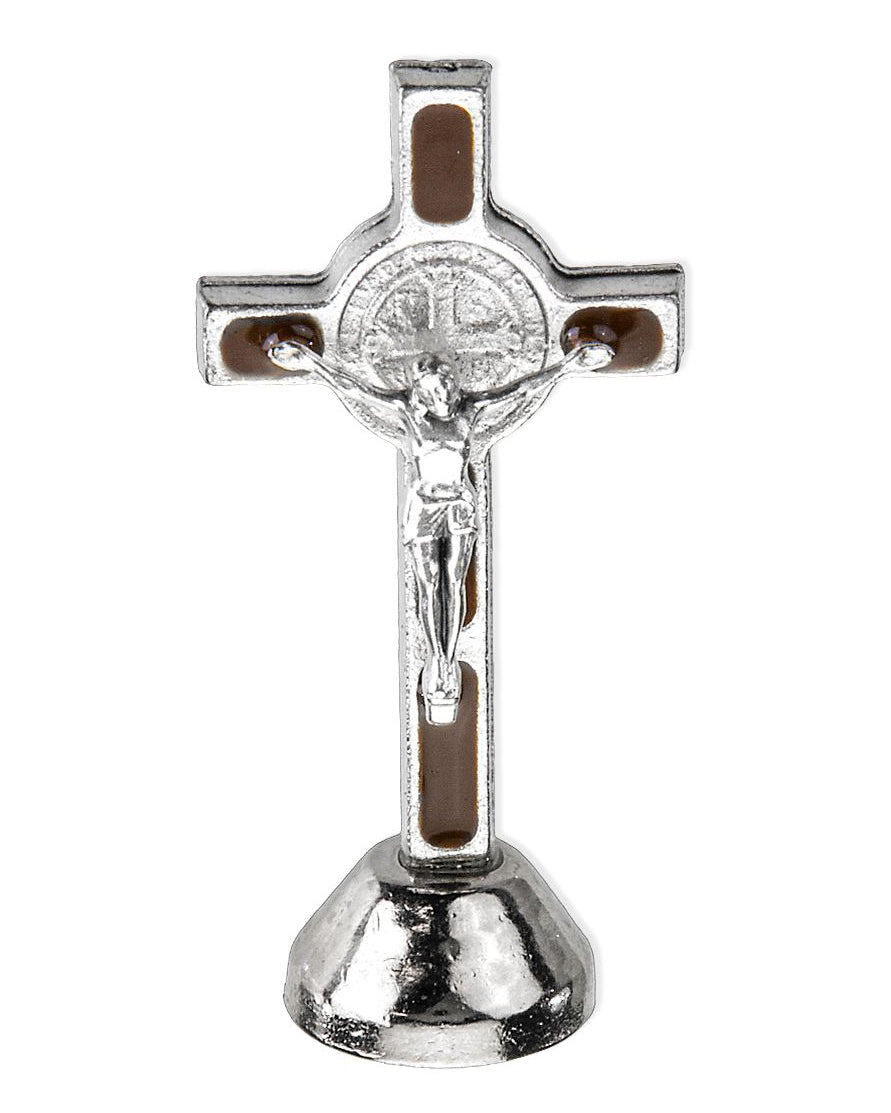 Silver crucifix with brown accents on a white background