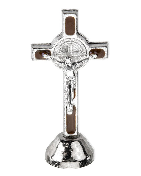 Silver crucifix with brown accents on a white background