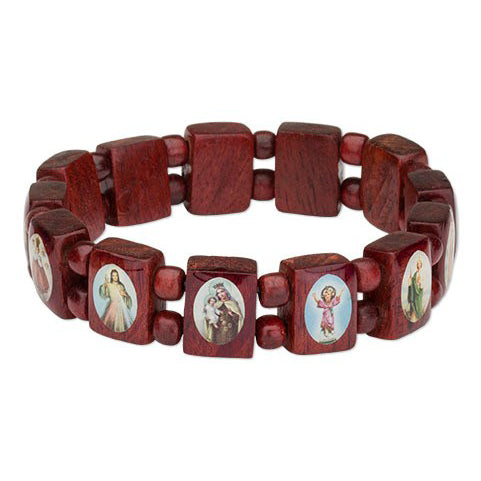 Wooden bracelet with religious iconography on red beads against a white background