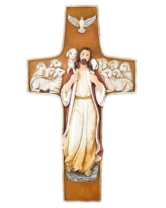 Decorative cross with a figure of a religious figure, possibly Jesus, surrounded by animals on a white background.