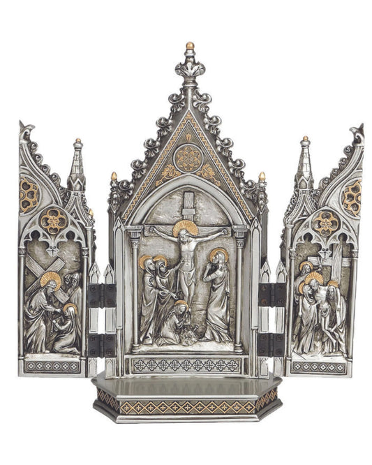 Decorative religious altarpiece with gothic design on a white background