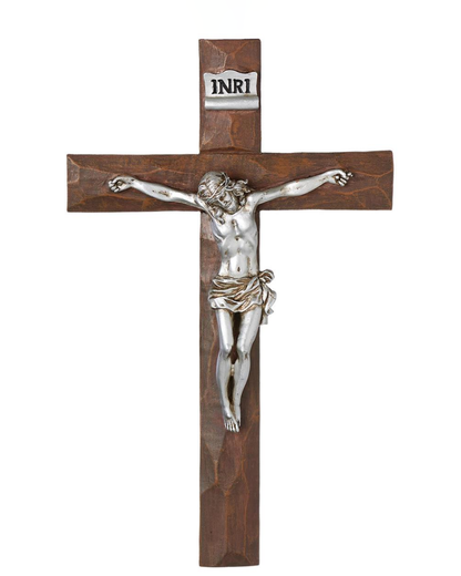 Wooden cross with silver Jesus figure on a white background