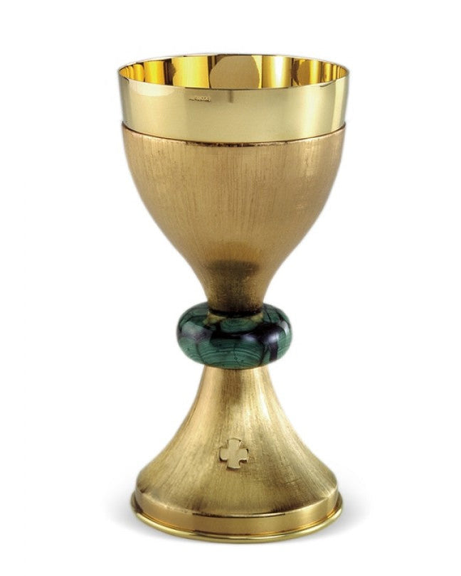 A gold-finished brass chalice with a stone-embellished knot at the base, against a white background.