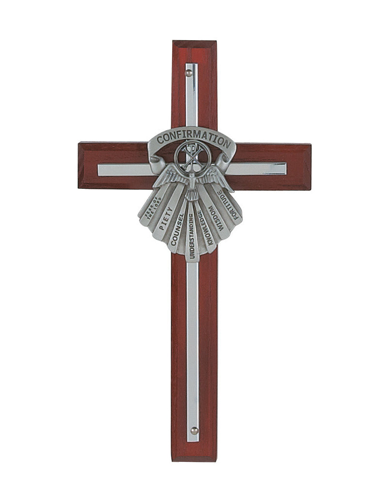 Wooden cross with silver confirmation emblem on a white background