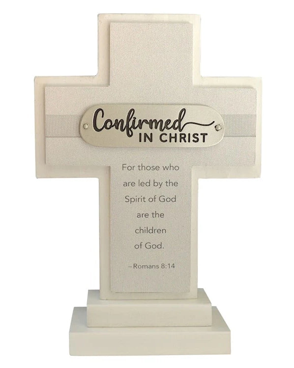 Decorative cross with engraved text on a white background