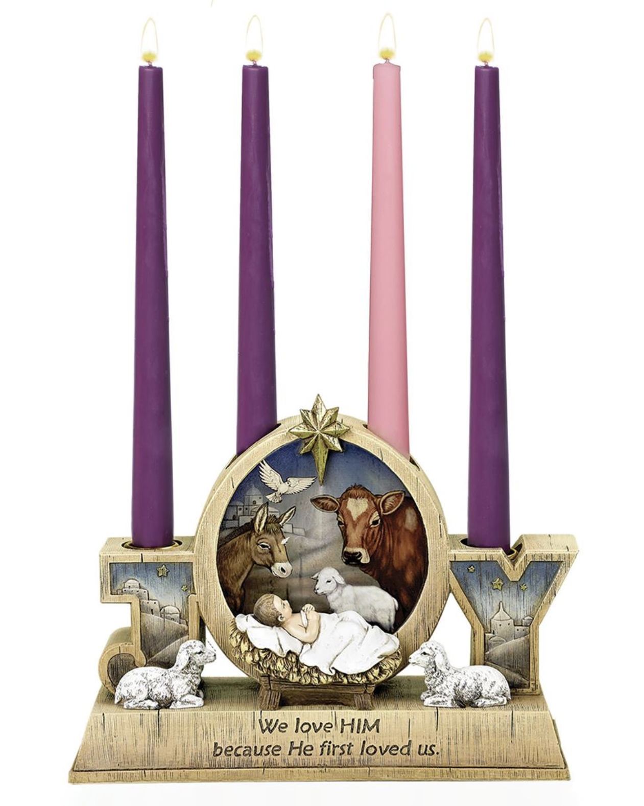 Advent wreath with nativity scene and colorful candles on a white background