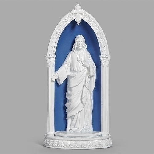 A white statue of Jesus Christ with a blue background, part of the Della Robbia collection.